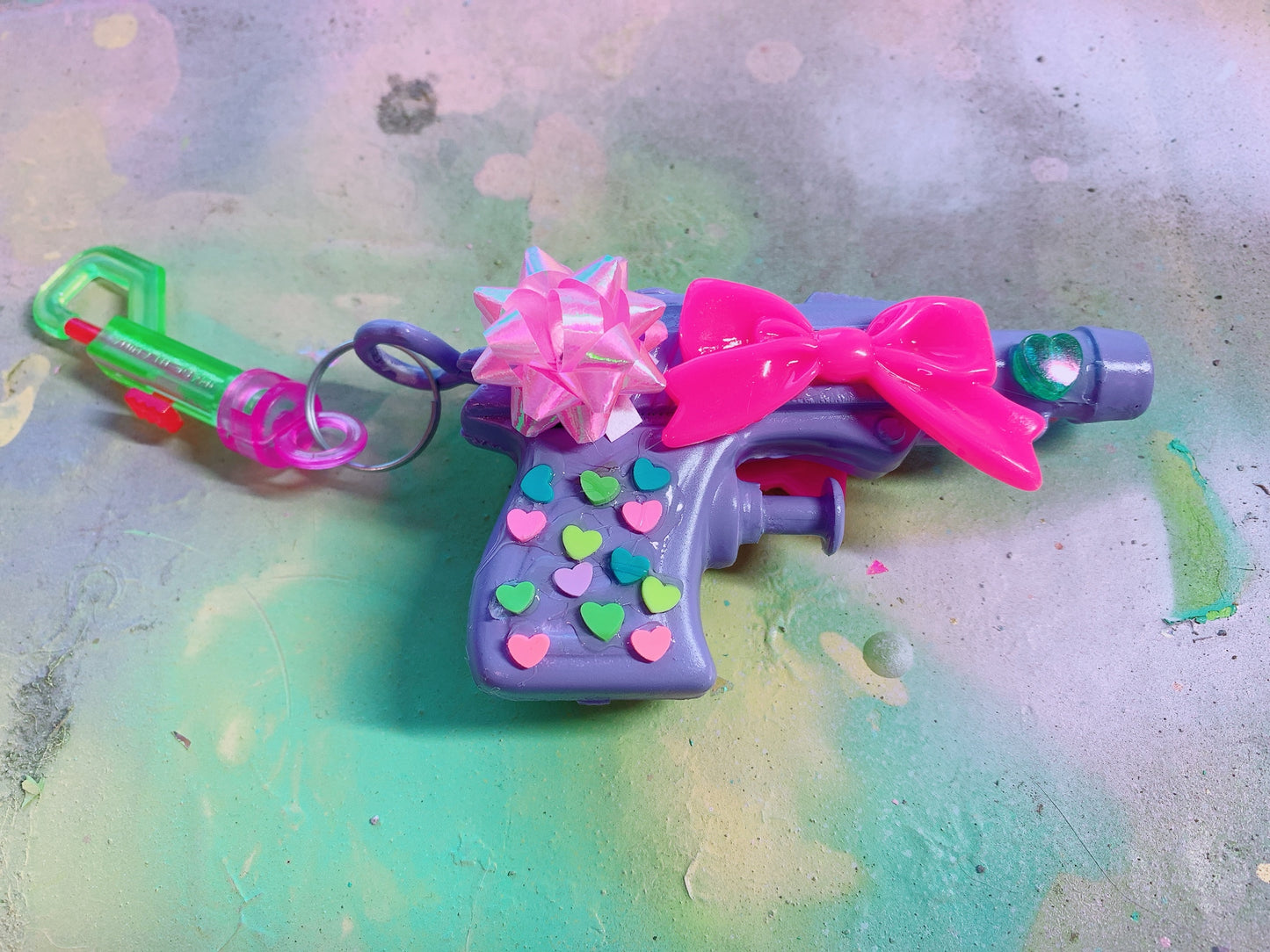 Purple Present Squirt Gun  (Bag Clip)